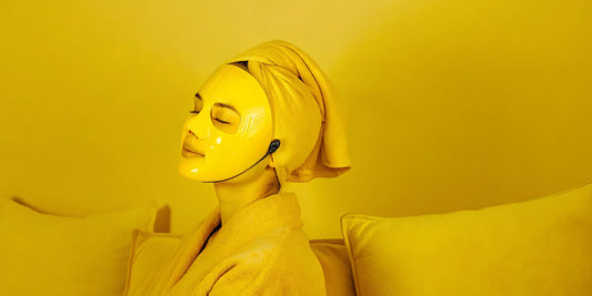 A dermatologist recommended LED face mask being used for an at-home skin treatment.